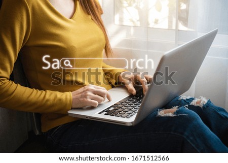 Women are sitting searching for information.