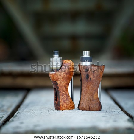 high end atomizer with stabilized natural wood regulated box mods, vaping device, selective focus