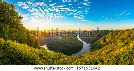 Saar river valley near Mettlach at sunrise. South Germany  Royalty-Free Stock Photo #1671631042