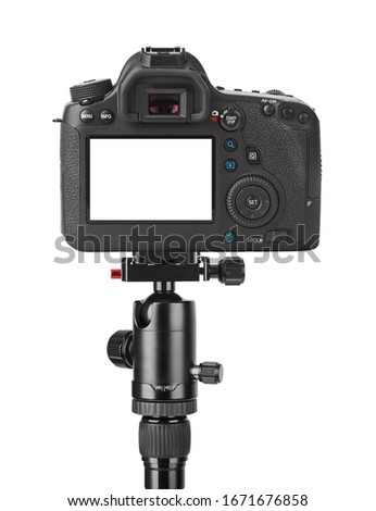 Camera on tripod isolated on white background Royalty-Free Stock Photo #1671676858
