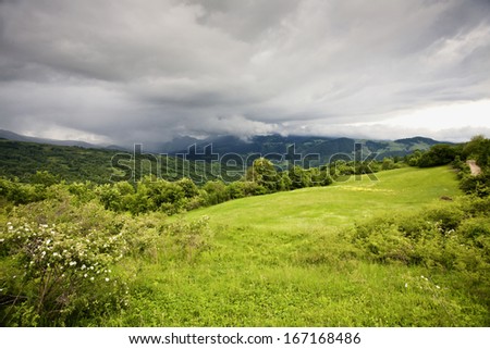 Mountain landscape with clouds before the rain