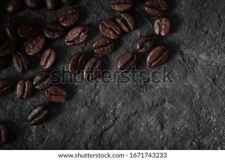 coffee beans background,Coffee beans close up,Closeup of coffee beans at roasted coffee heap.