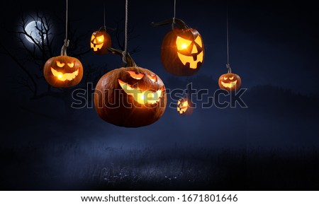 Halloween design with pumpkins . Mixed media