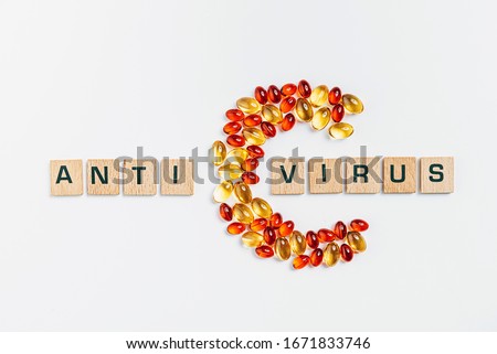 the letter c made from transparent pills next to the inscription antivirus on a white background