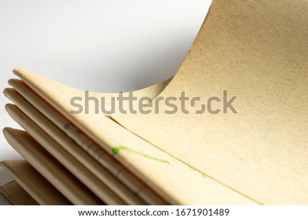 Old vintage paper documents on white background paper corners with free blank space selective focus with depth of field.