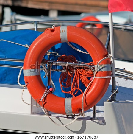orange life buoy on a boat