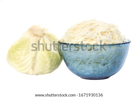 Sliced cabbage in bowl white background