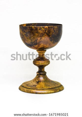 Detailed picture of an old chalice object  in white background 
