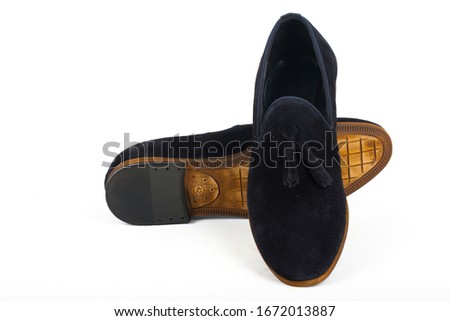 Men's classic navy blue suede shoes isolated on white background