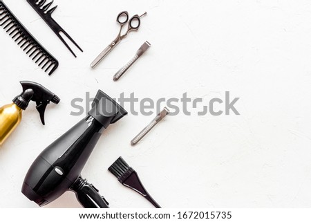 Beauty saloon concept. Hairdresser accessories pattern on white background top-down frame copy space