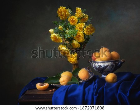 Still life with yellow roses and apricots