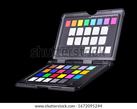 Rainbow color palette or colorchecker calibration passport for post production in photography isolated on black background with clipping path