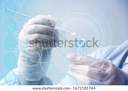 scientist, doctor holds a laboratory test tube and does a test of biological material for DNA, pathologies, viruses, blue virtual display, concept bacterioscopic research method Royalty-Free Stock Photo #1672181764