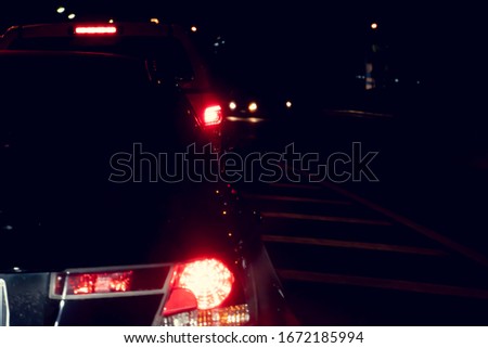 Blurred images of light traffic on the night road.