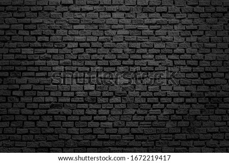 Old brick black color wall. Vintage background, black background, vintage marbled textured border Royalty-Free Stock Photo #1672219417
