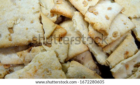 yellow cookies with peanuts and sugar                         