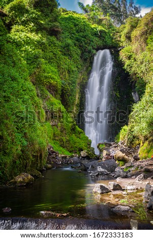 beautiful picture of peguche waterfall on Otavalo Imbabura Ecuador