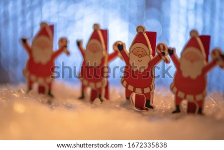 Christmas decoration from the round dance of Santa Claus