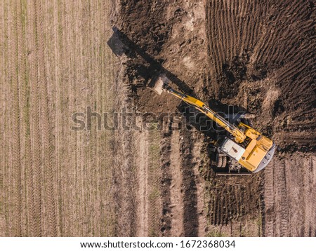 Excavator top down aerial drone  shot.
