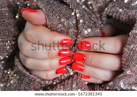 Nail Polish. Art Manicure. Modern style red Nail Polish.Stylish pastel Color white Nails hold . Classic wedding bride nails design.Stylish trendy female manicure. Beautiful young woman's hands