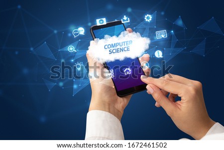 Female hand holding smartphone with COMPUTER SCIENCE inscription, cloud technology concept