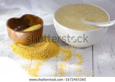 Golden rice porridge on the table