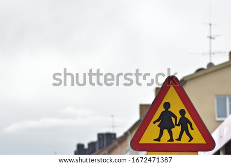  Street sign school zone red black yellow