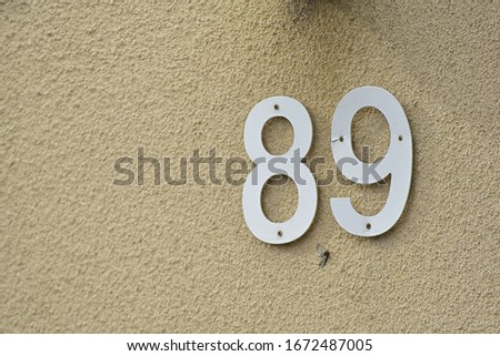  Address number 89 on the wall 