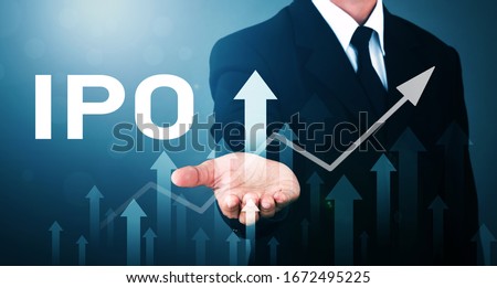 Man without head standing Catching Pose Visual arrow Showing uptrend with IPO text on Blue tone with Len Flare. Initial public offering. Royalty-Free Stock Photo #1672495225