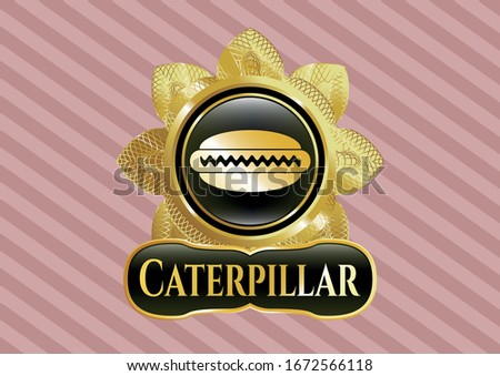  Gold emblem or badge with hot dog icon and Caterpillar text inside