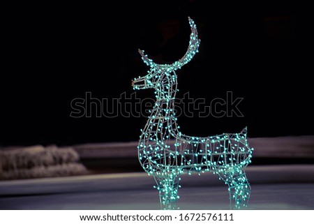 Deer from garlands for the new year. Cristmas decoration.