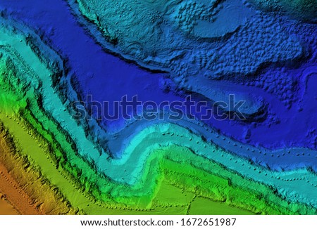 DEM - digital elevation model. GIS product made after proccesing aerial pictures taken from a drone. It shows excavation site with steep rock walls Royalty-Free Stock Photo #1672651987