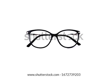 Eyeglasses in black frames on white background isolated background Royalty-Free Stock Photo #1672739203