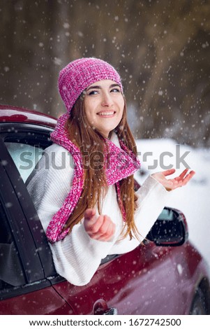 girl with a car, snow and car.