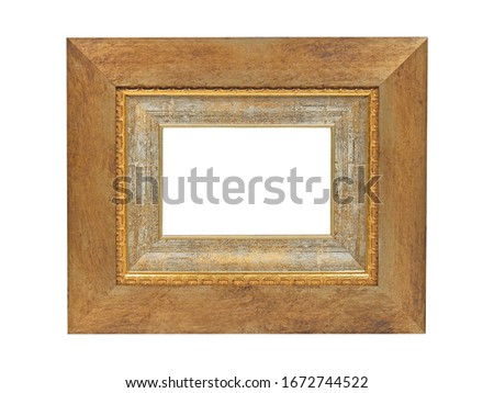 Empty wooden frame for paintings with gold patina. Isolated on white background