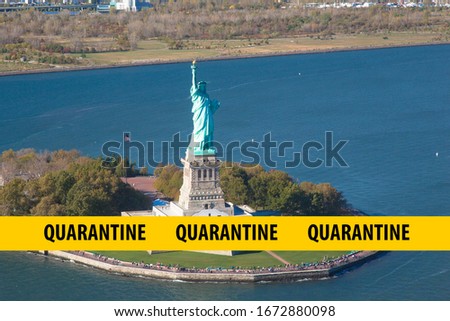 The inscription quarantine on yellow against the background of the statue of liberty in New York. The concept of coronavirus covid-19 in the United States in new york, national emergency.