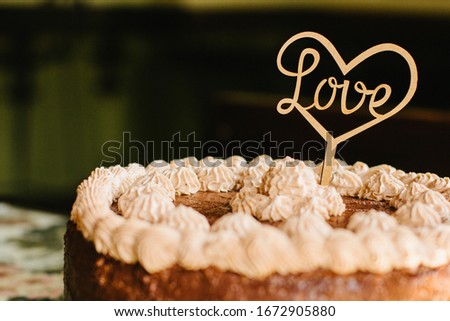 Cake with cream and love word