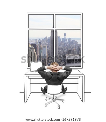 young businessman sitting and looking at drawing window