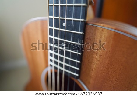 Acoustic Guitar Body on Stand Photography Background