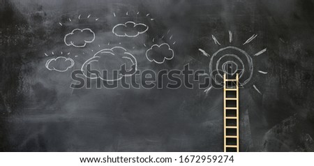 wooden ladder and sun info graphics over blackboard background