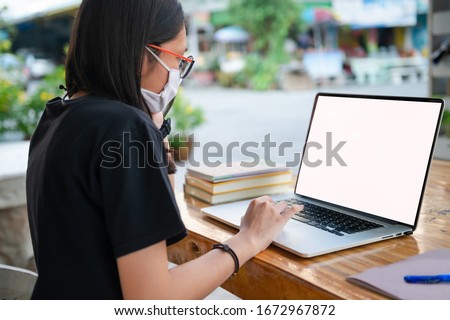 social distancing student concept, education at home. Junior high school girl Do homework at home with laptop. Teen study home the school is closed during Coronavirus Covid-19. 