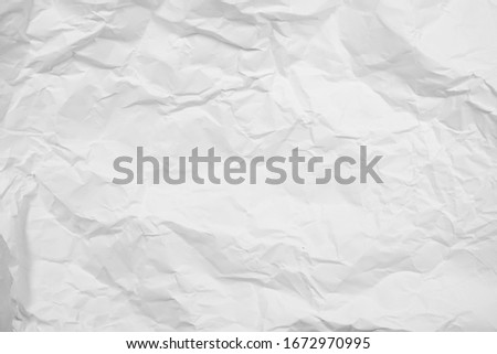 Abstract background with white crumpled paper. Royalty-Free Stock Photo #1672970995