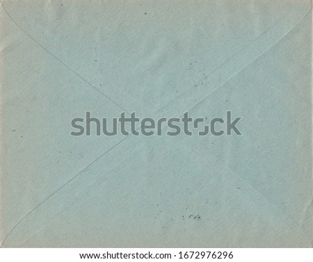 Back side of old postal envelope grey-blue color,vintage paper texture