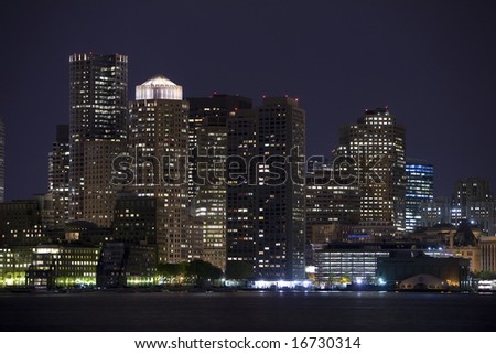 Horizontal image of downtown Boston with water in the foreground