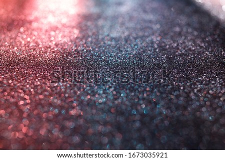 Pink and gray glitter texture abstract background. Defocused bokeh.