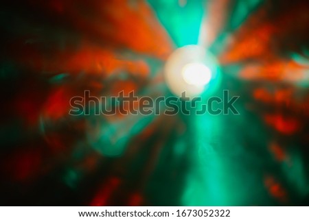 Lens flare effect. Different colors Abstract background.