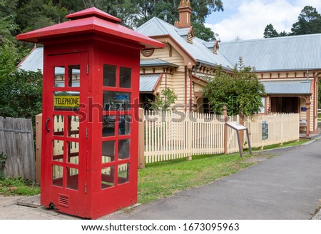 Old style public telephone box in the historic township of Walhalla, in Victoria, Australia.