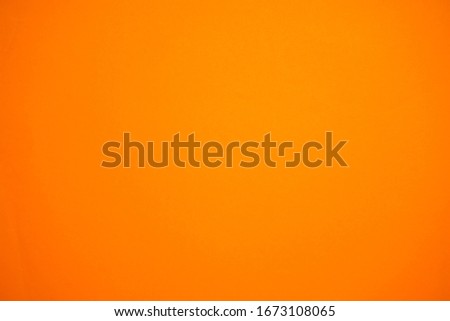 abstract background with surface of orange paper for background ,vintage style. Royalty-Free Stock Photo #1673108065