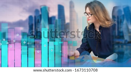 Analysis of statistics. The girl is working at the computer against the background of graphs and diagrams. Study of changes in demand for goods. Fluctuations in stock indexes.