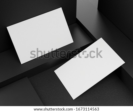 3d rendering of a business card mock-up on a black paper background